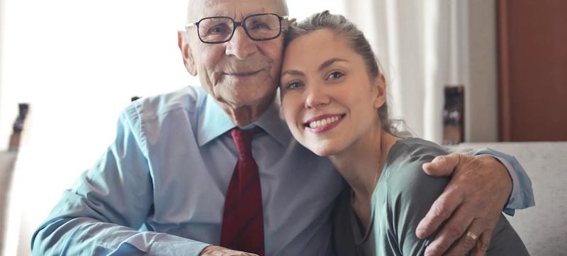 Elderly man shown with his daughter.