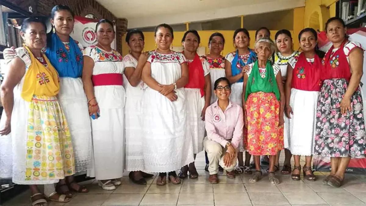 a group of people in traditional Mexican clothing