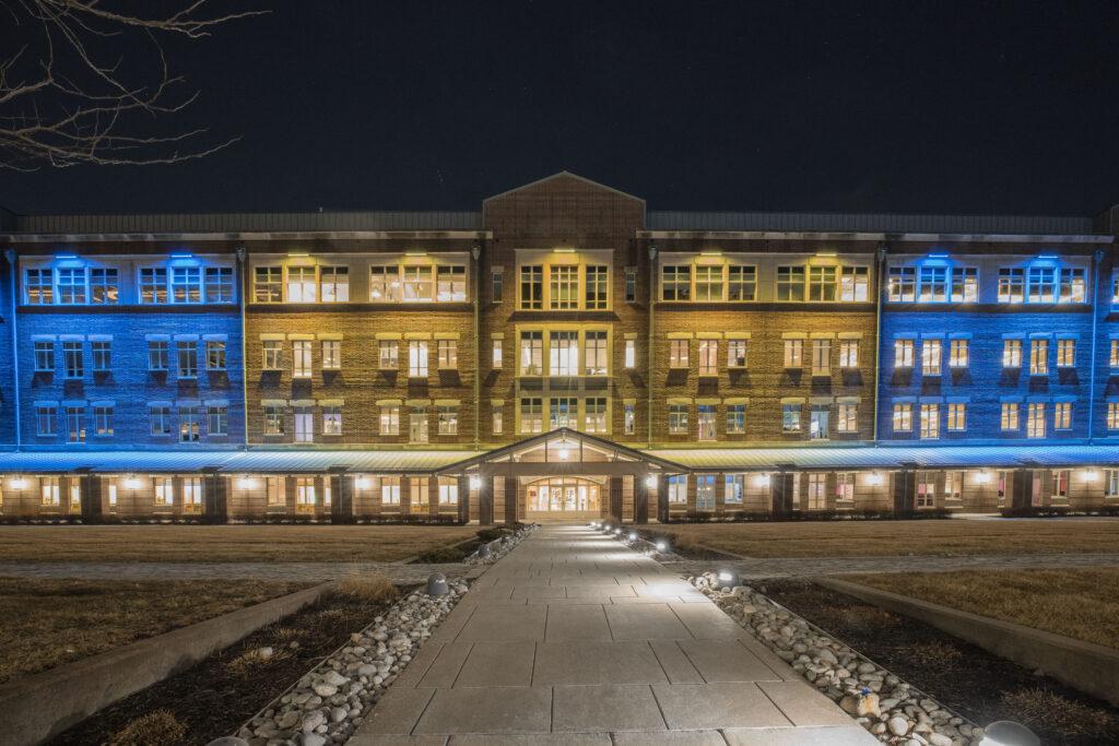  T-Mobile Headquarters in Overland Park, KS lit up in yellow and blue lights