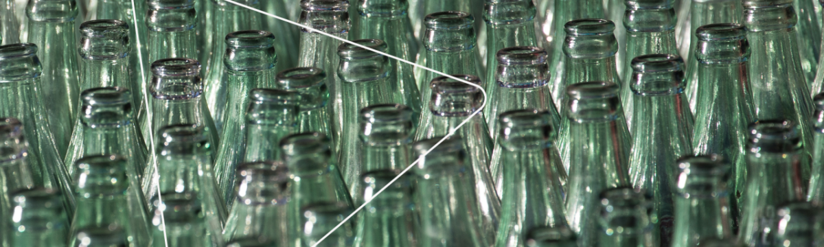close up of a group of glass bottles